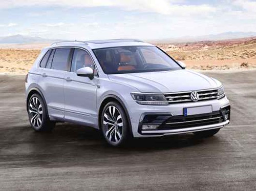 Silberner Volkswagen-SUV auf einer Straße in einer kargen Landschaft.
